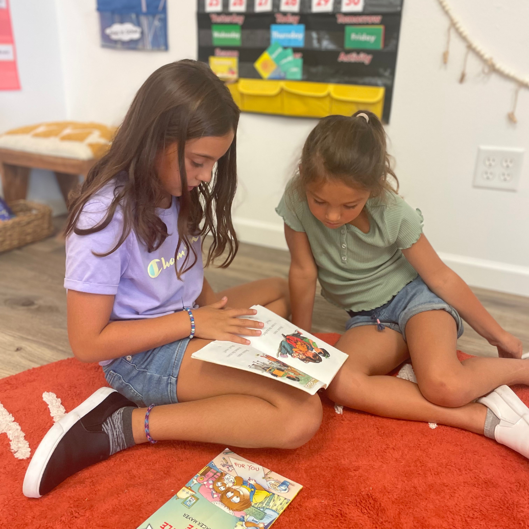 school kids reading a book out loud at freedom academy in eagle idaho